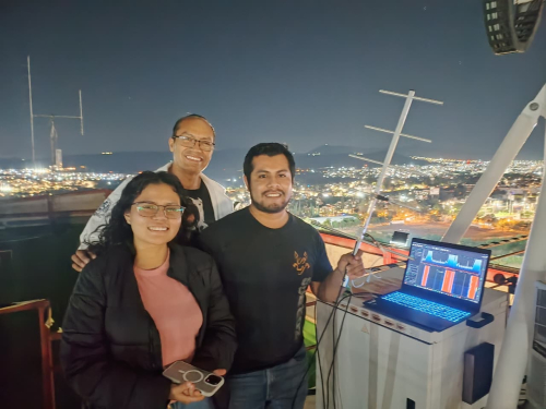 City lights backdrop while decoding signals at UNAM